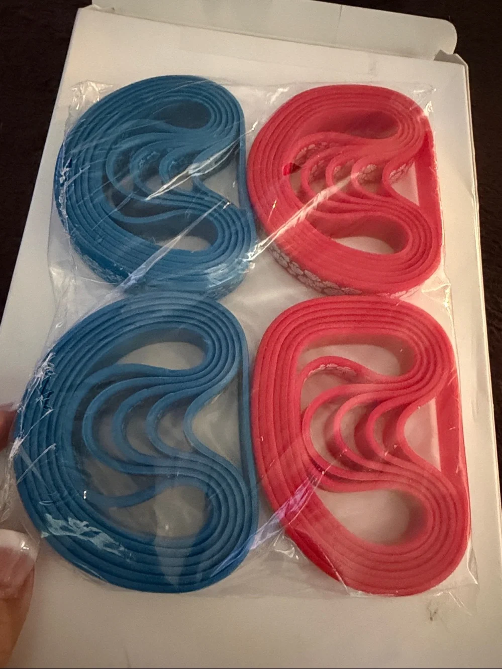 NEW set of 24 silicone Hawaiian themed bracelets (red & blue)
